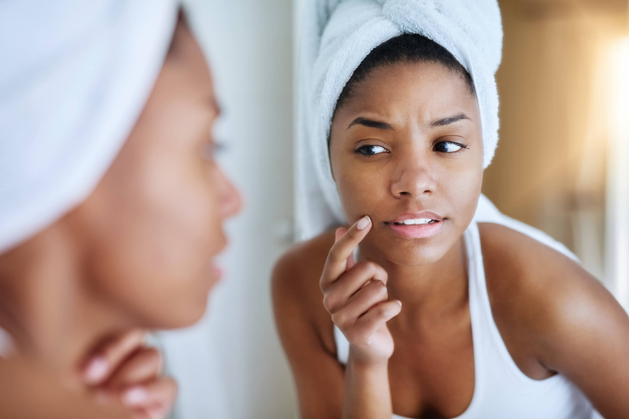 woman with dark spot or acne scar